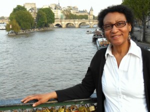 About Us image 1 Portrait - Julia on Pont des Arts