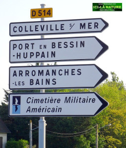signpost for colleville and arromanche