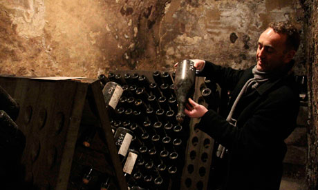 Champagne region producer demonstrating champagne making process seen on Walking The Spirit Tours full-day Champagne excursion