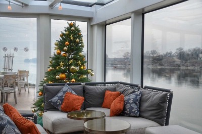 river cruising lounge area with decorated Christmas tree